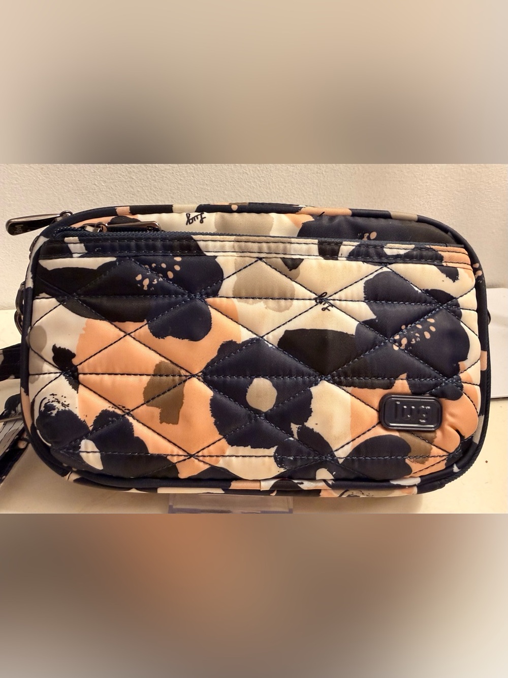 Lug “Roundabout” crossbody bag.
